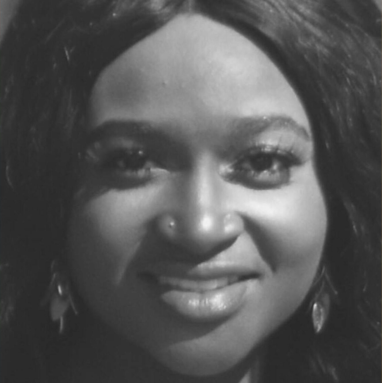 Alicia Obafemi headshot in B&W